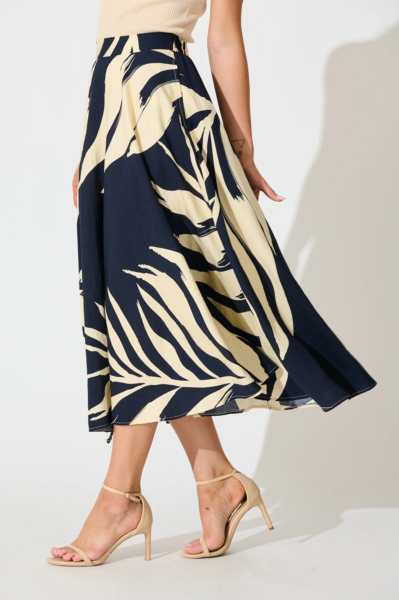 Aria Midi Skirt in Navy and Cream Leaf Print - Image 2