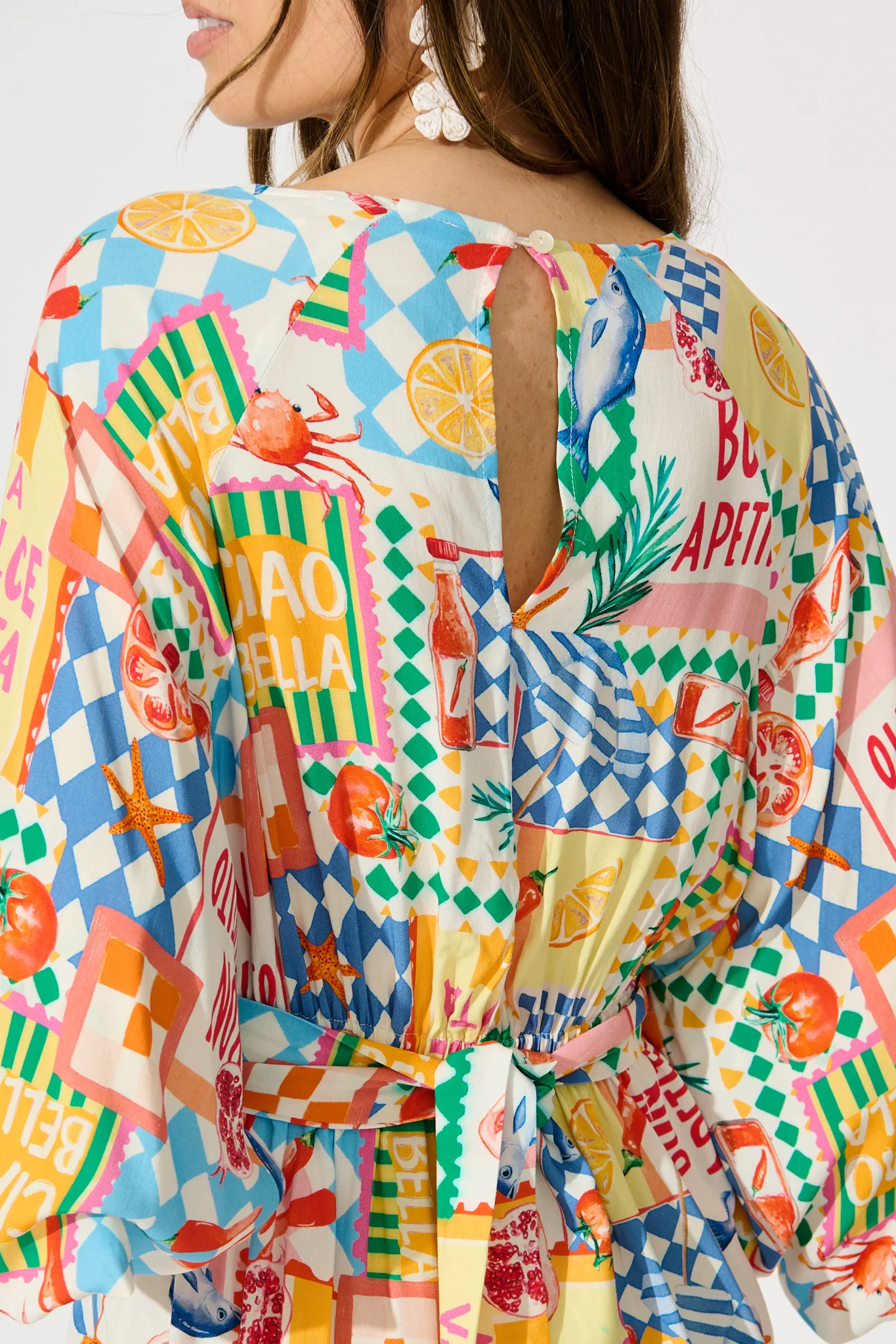 Otillie Playsuit in White Multi Conversational Print - Image 6