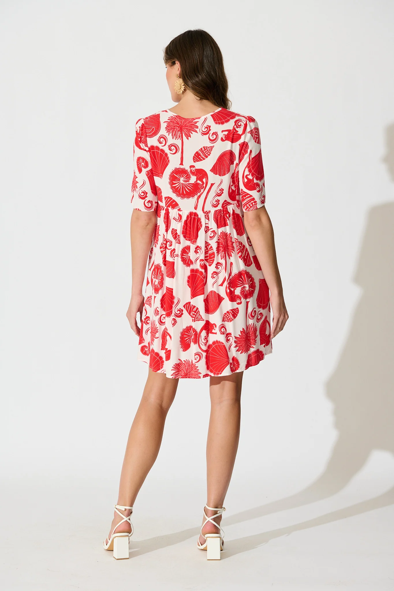 Shake It Out Smock Dress in Off White with Red Shell Print - Image 4